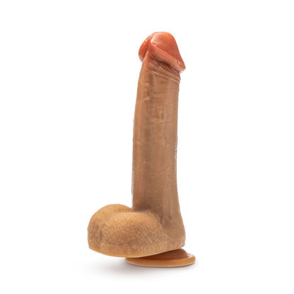 Dr. Phillips 8.5 Inch Silicone Thrusting Dildo - Tan