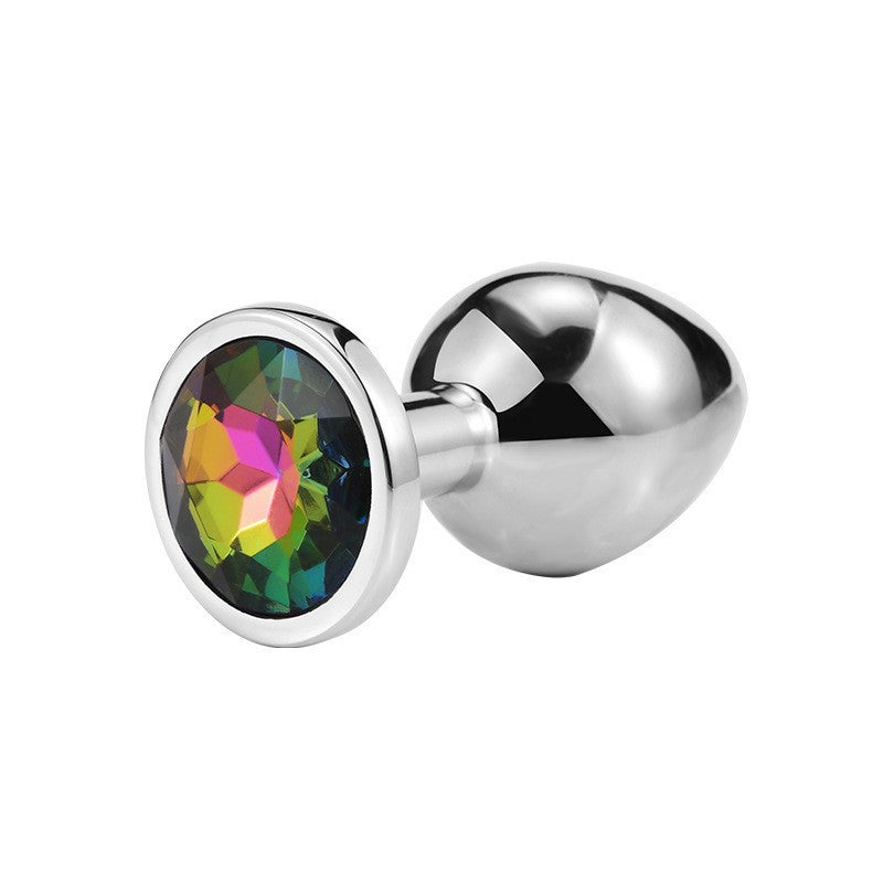 Round jeweled metal plug with rainbow jewel
